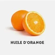 deux oranges découpées représentant l'huile d'orange