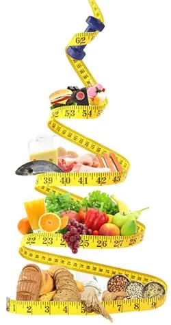 metre ruban à mesurer avec des aliments legumes fruits et poissons viandes