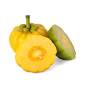 Deux fruits jaunes au garcinia avec des tiges vertes un fruit coupé en deux