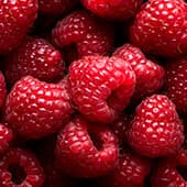 plusieurs framboises rouges entassées - images petit format