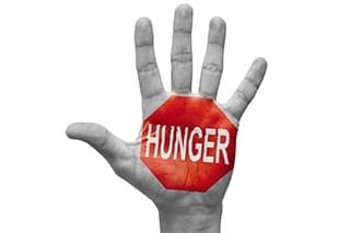 logo hunger sur une main sur un fond blanc - weightworld