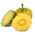 Un garcinia cambogia entier et un garcinia coupé en deux