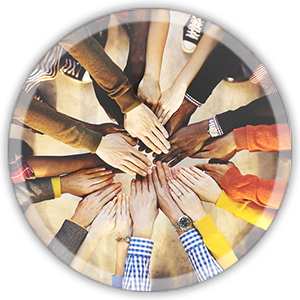 people in a circle with hands in the middle to show diversity